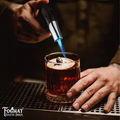 Foghat Culinary Torch flaming craft cocktail with blue jet flame for professional bar presentation