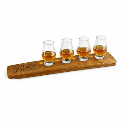 Custom logo engraved whiskey flight board with four Glencairn glasses for bourbon tasting isolated on white background