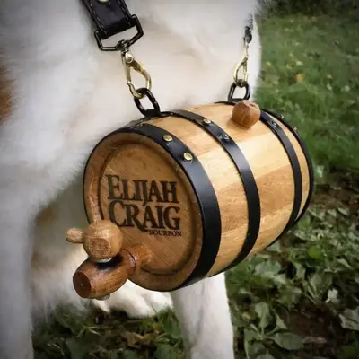 Personalized mini oak barrel dog collar with custom whiskey brand logo, creative promotional product for distillery marketing and retail